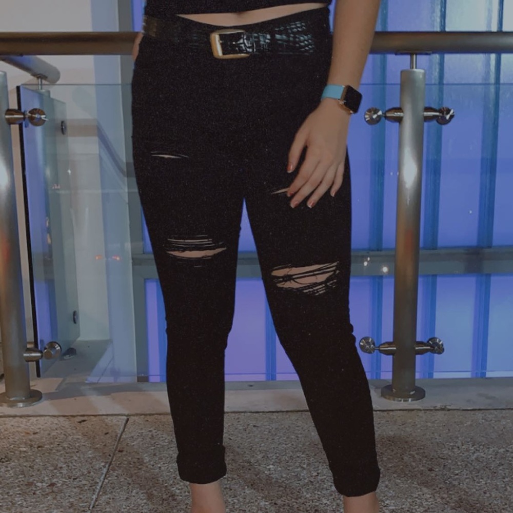 Black ripped jeans- Size 2 but fits size 4
